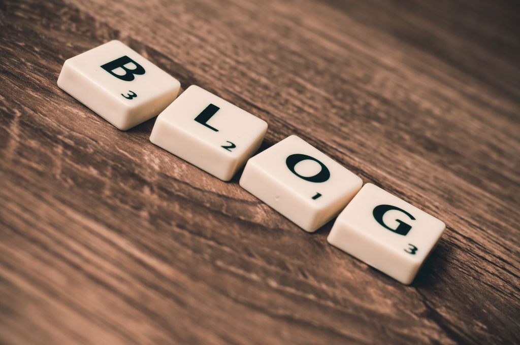 Best place to get a domain + build a website?